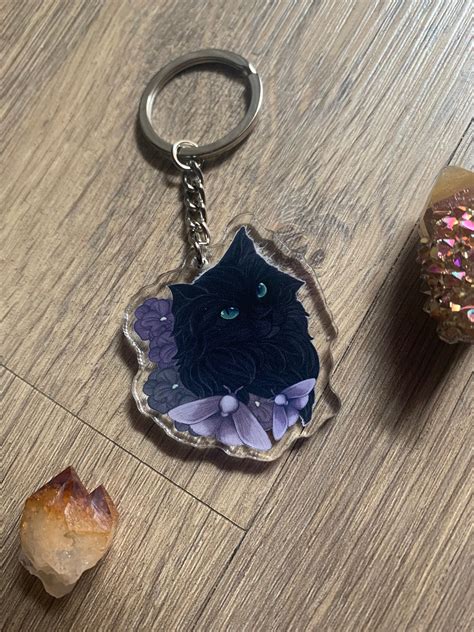 prada black cat keychain